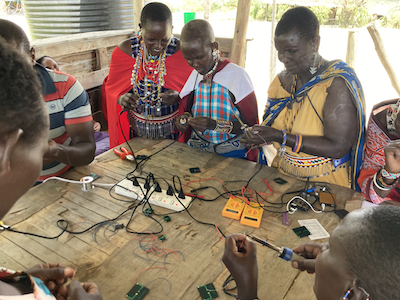 women working with technology