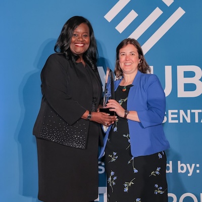 people holding a NACUBO award