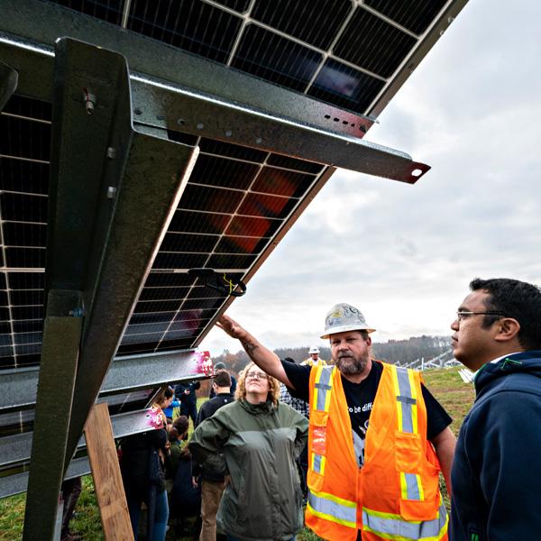 Researchers and students visit the site of sustainable construction. 