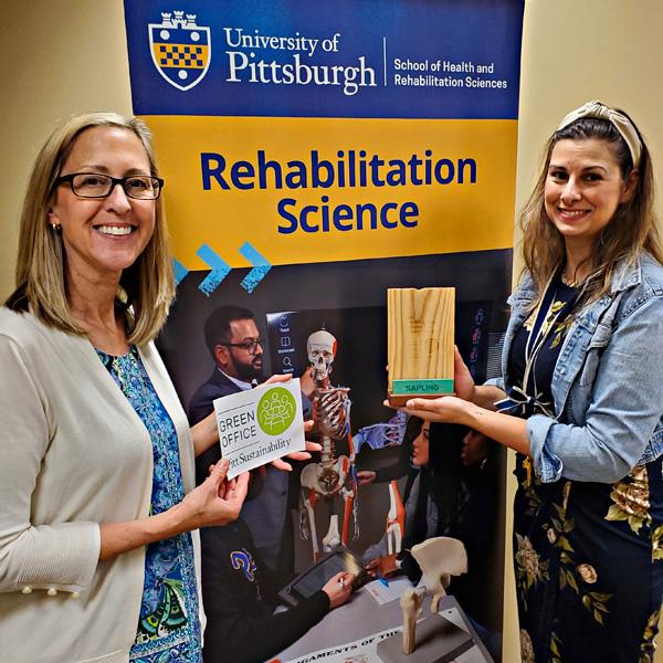 Rehab science administrators celebrate a green designation. 
