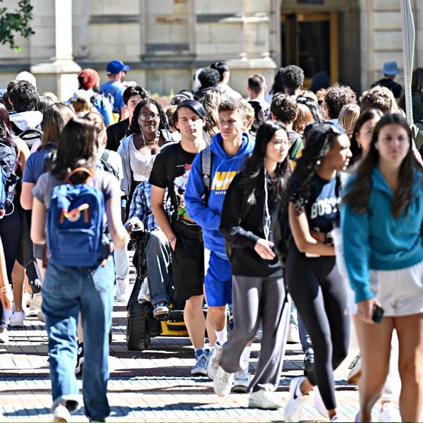 Pitt students walk through campus.