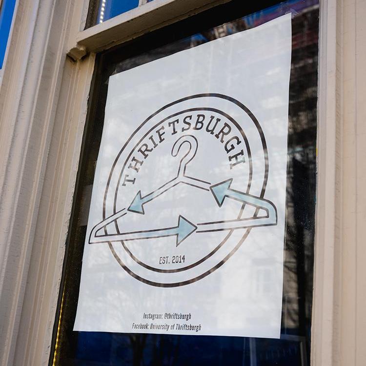 Window of Thriftsburgh with sign